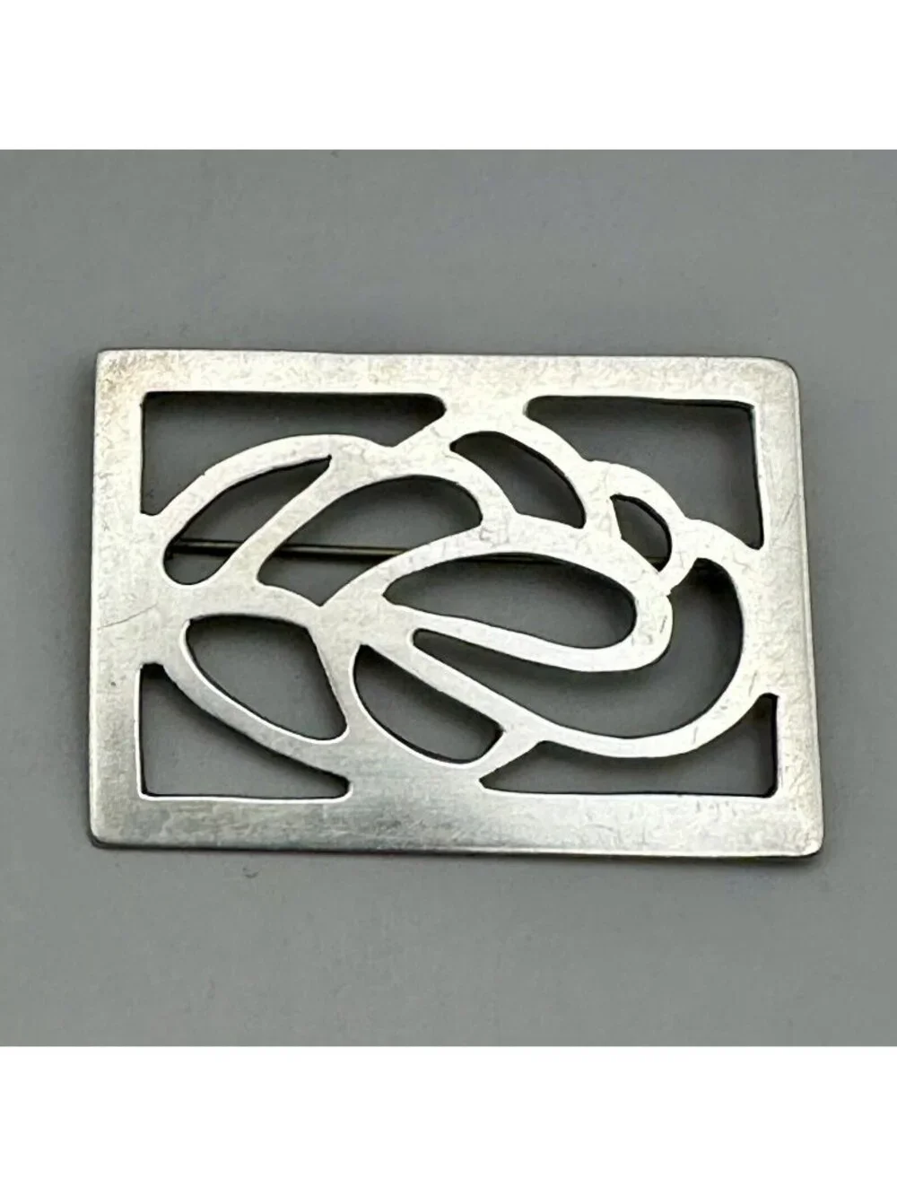Modernist Cut Out Scrolls Brooch Signed John Bryan Sterling Silver Hand Wrought